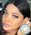 Diva Aloe Vera circle lenses are dramatic but natural looking-- popular with Instagram models, influencers and makeup artists. Stun everyone with beautiful eyes in pale blue green hues, and have them wonder if you were born with them. Each pair of Diva Aloe Vera light grey hazel circle lenses comes with a free contact lens case and ships fast from the USA.