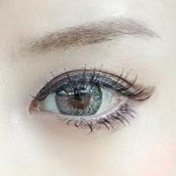 Closeup of Barbie Puffy Grey circle lenses on brown eyes