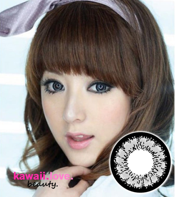 Barbie Angel Grey are pigmented deep grey circle lenses featuring a thick black outer circle limbal ring that creates a hyper dolly eyed look and extra large diameter for maximum eye enlargement. The popular Angel design is a true classic, and each pair of Barbie Angel Grey big eye circle lenses comes with free contact lens case and ships fast from the USA.