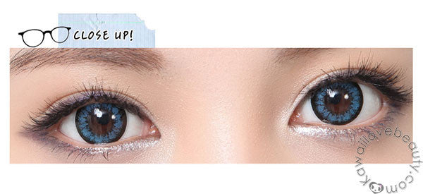 Closeup of Angel Blue circle lenses on dark colored eyes.