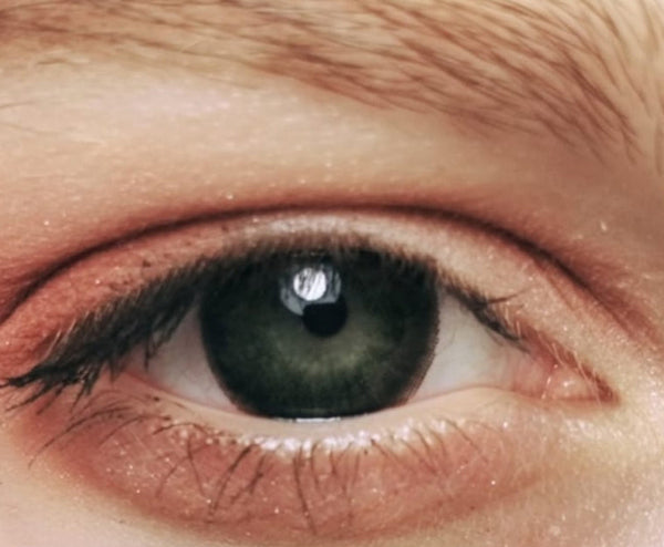Urban Layer Cloud Black colored contacts over blue eyes. We ship our silicone hydrogel circle lenses fast from the USA.