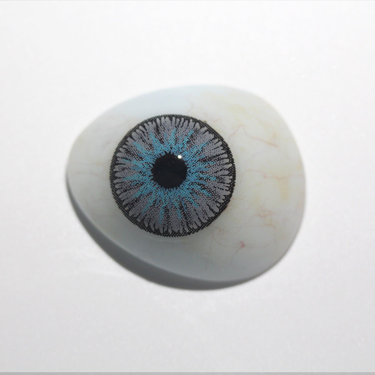 Crazy Lab by Urban Layer Doll Gray colored contacts, featuring cute big-eye circle lenses in cool, bright grey for kawaii anime cosplay. Enjoy fast, free shipping across the USA.