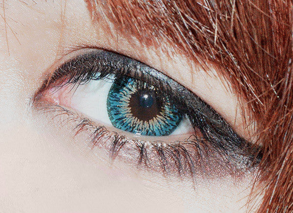 Closeup of Geo Twins Aqua Blue YH302 opaque soft colored contact lenses.