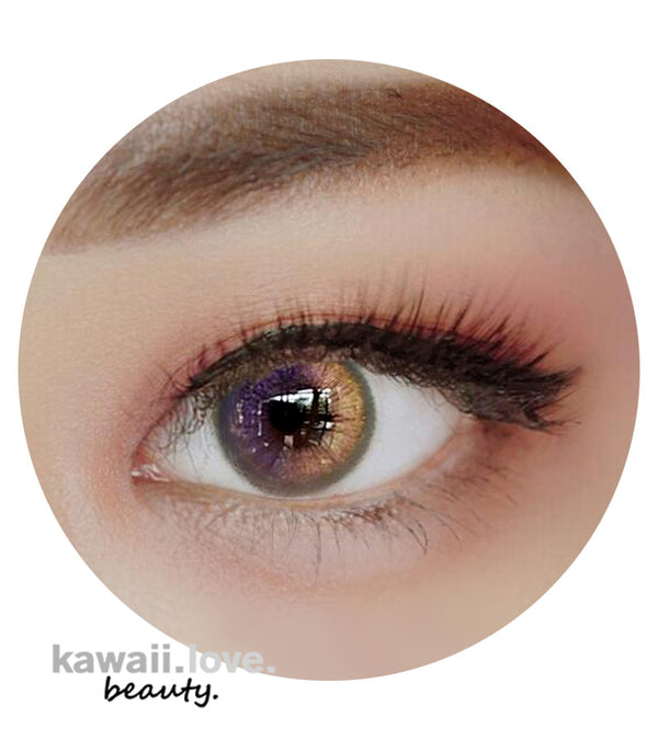 Sweety Honey Violet circle lenses are mesmerizing purple and rose gold colored contacts that feature a defining darker limbal ring for eye definition and tiny gold glitters for a magical, iridescent shine. Your Honey Violet two-tone ombre circle lenses come with a free contact lens case and ship fast from the USA.