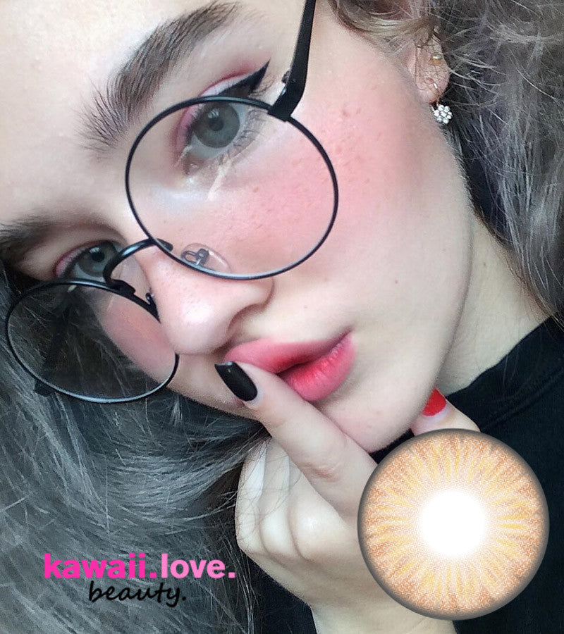 Orlando Hazel colored circle lenses by Urban Layer Korea are the newest in realistic 3 tone blend contact lenses. These lovely hazel hued lenses feature a natural and delicate gradient of hazel brown colors. Make a classic fashion statement with Orlando Hazel circle lenses-- with each pair we include a free cute contact lens case and fast shipping from the USA.