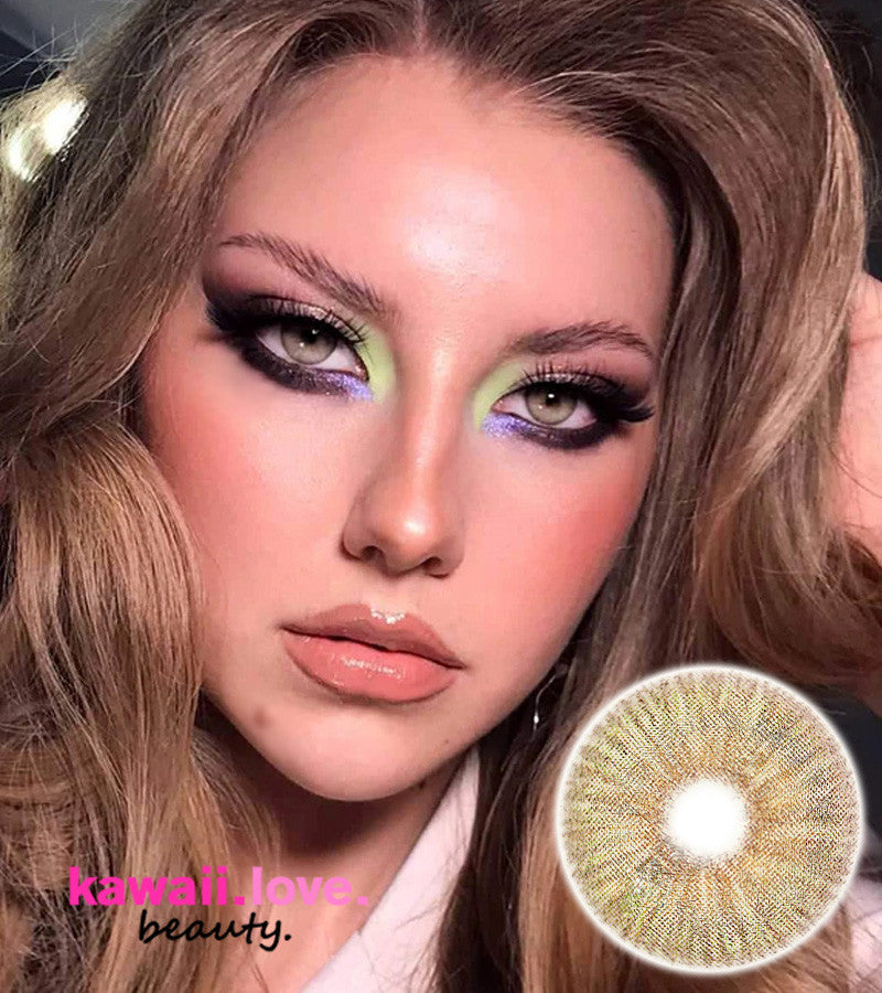 Angeles N Brown are bright but natural light colored contact lenses that feature a multicolored hand-painted style, sure to turn heads and elicit many compliments. Try new Angeles N Brown lenses by Urban Layer Korea for a gorgeous pop of honeyed color that mimics the natural variations in light colored irises. Each pair of Angeles N Brown circle lenses comes with a free cute contact lens case and ships fast from the USA. Main image