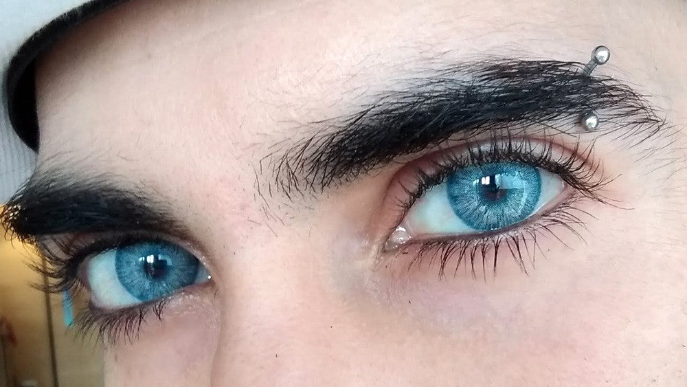 Urban Layer Blue Rain hand painted effect colored contact lens over dark brown eyes