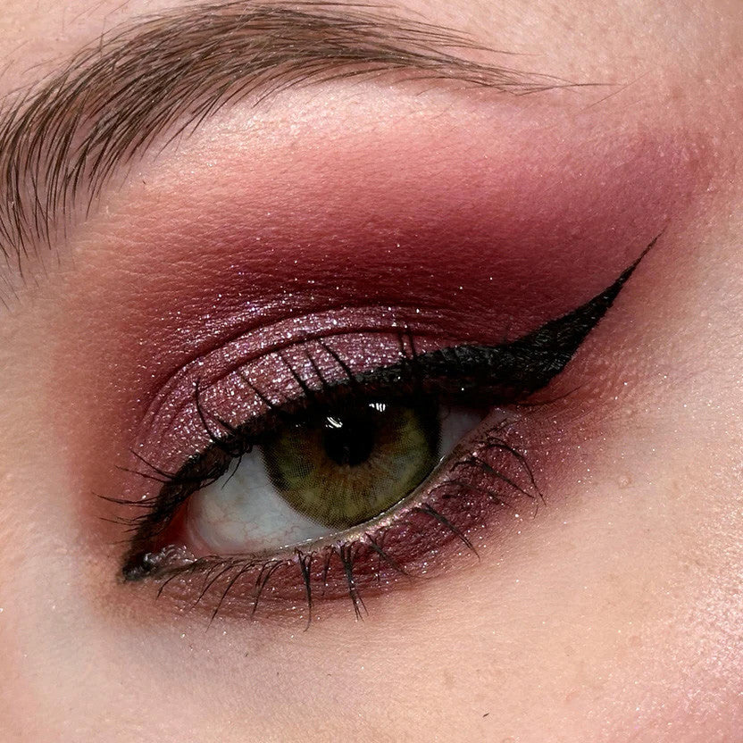High quality circle lenses and green colored contacts shown over lighter natural eyes. This model is Cleopatra Green by Urban Layer, fast shipping from the USA.