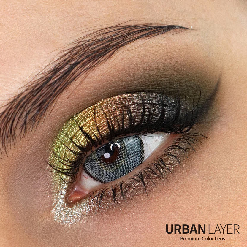 Urban Layer Daddario Gray contacts on dark brown eyes, manufactured by Urban Layer Korea. These grey lenses ship fast from the USA.