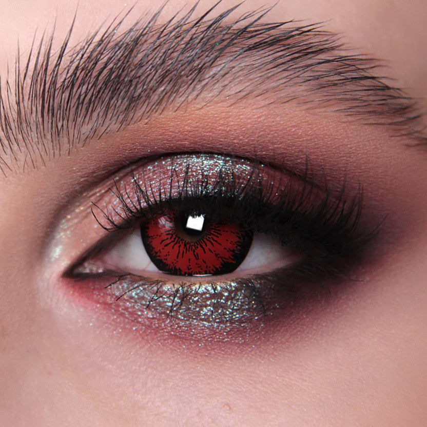 Unleash your anime or doll-like charm with Tokyo N Red Circle Lenses, featuring a bold red hue and a thick black limbal ring for a striking, captivating effect. Made with silicone hydrogel for all-day comfort, perfect for cosplay or dramatic fashion statements. Available now for a mesmerizing eye transformation. Main image