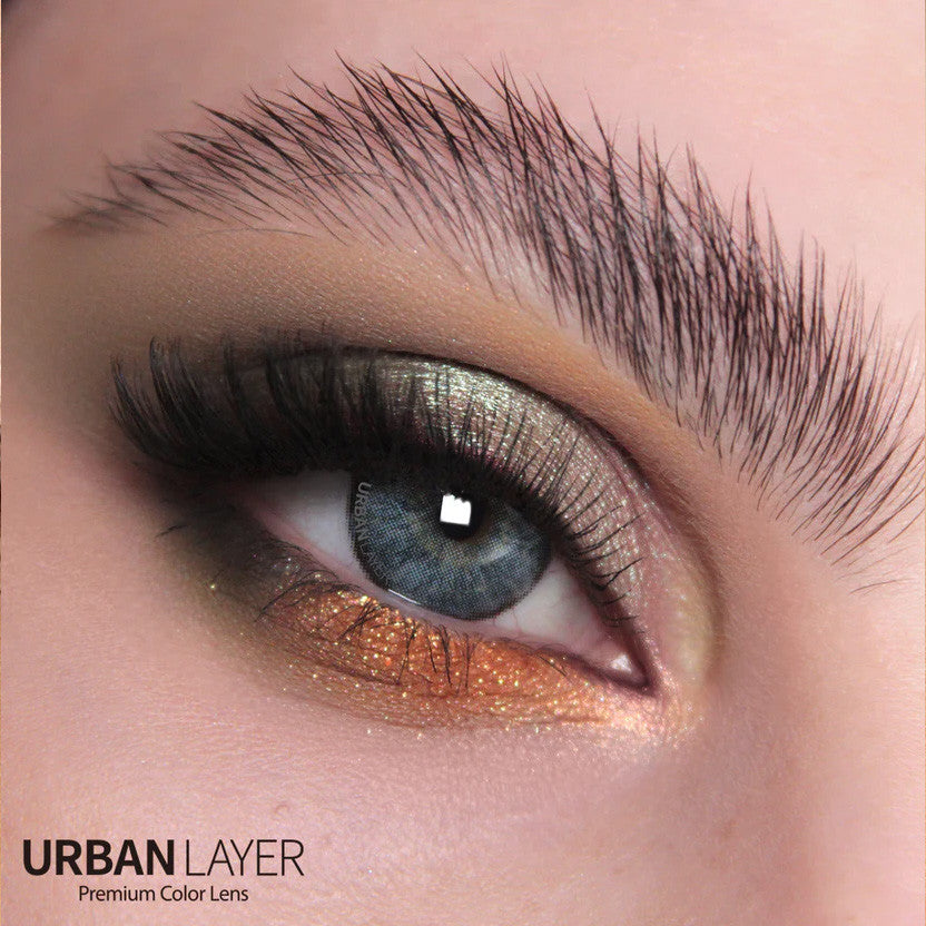High quality circle lenses and grey colored contacts shown over dark eyes. This model is Daddario Gray by Urban Layer, fast shipping from the USA.