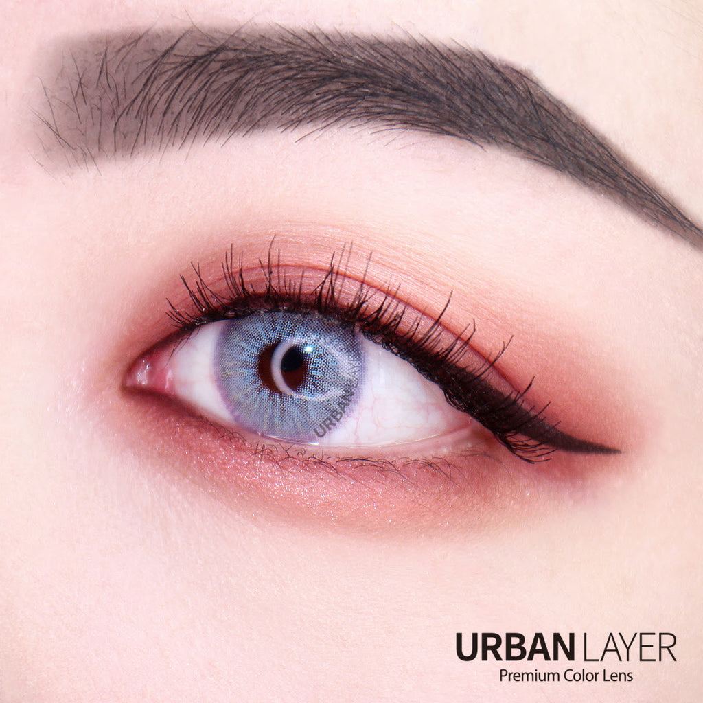 High quality circle lenses and colored contacts shown on dark eyes. This model is Las Vegas N Ash Blue by Urban Layer, fast shipping from the USA.