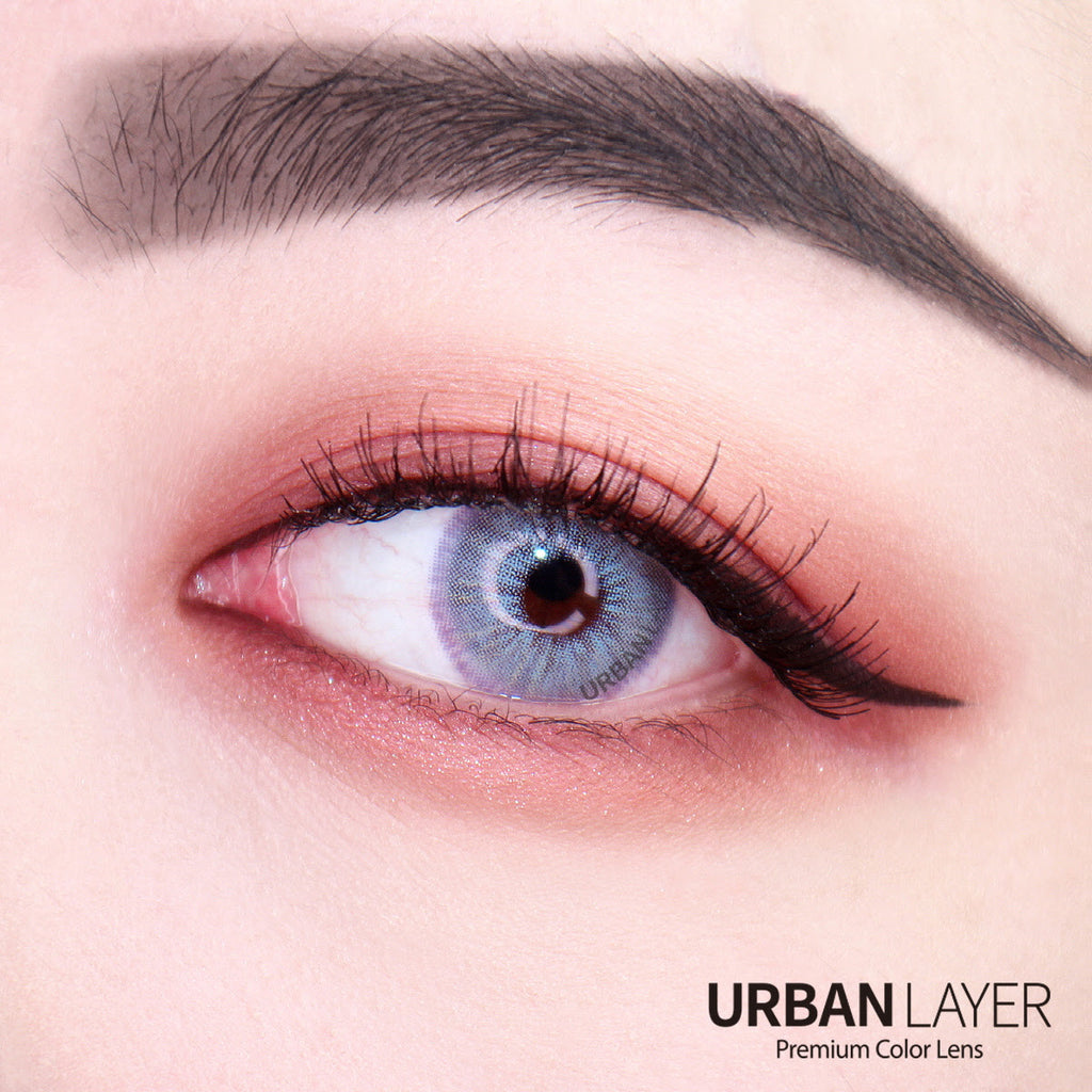 Urban Layer Las Vegas N Ash Blue contacts on dark brown eyes, manufactured by Urban Layer Korea. These blue lenses ship fast from the USA.