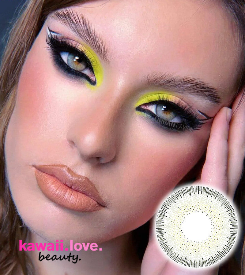 Transform your gaze with our ceautiful and natural-looking Prague gray colored contact lenses, your ticket to achieving an effortlessly enchanting and sophisticated look. These lenses are meticulously designed to provide a soft gradient color that seamlessly blends with your natural eye shade. The delicate limbal ring adds depth to your eyes, making them appear larger and more defined, without ever looking unnatural. Crafted with silicone hydrogel, they prioritize both comfort and clarity, ensuring all-day 