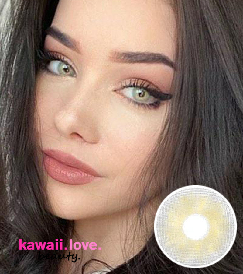 Urban Layer Yukon Yellow (USA stock) are natural looking and uniquely blended light gray colored circle contact lenses that were inspired by the Yukon gold rush. Discover the full color transformation with these stunning grey and golden gradient accessory for your eyes.  Main image
